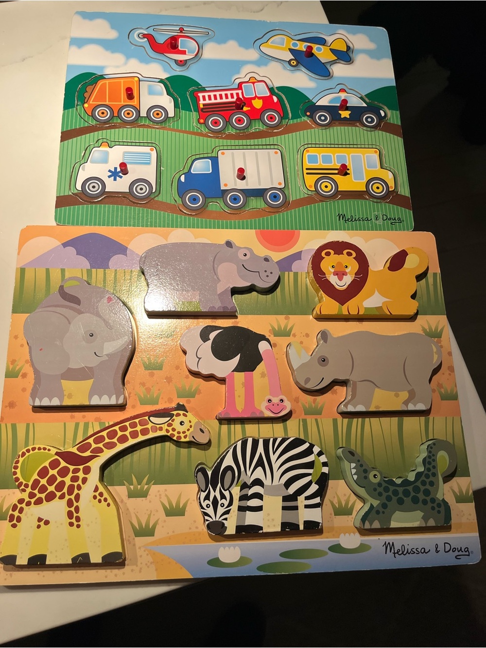 Two wooden Melissa & Doug puzzles. Age 2+.